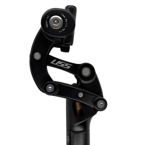 Close-up of black Suspension Seat Post With 50mm Travel For Road, Gravel And Mountain Bikes showing mechanics and logo.