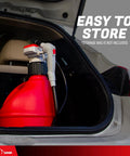 TERA PUMP gas can transfer pump side view with red plastic fuel can and white nozzle in car trunk