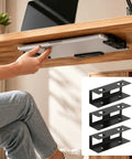 Person placing laptop on Rock Solid Under Desk Laptop Mount Built Tough Adjustable Metal Shelf, ideal for laptops and tablets.