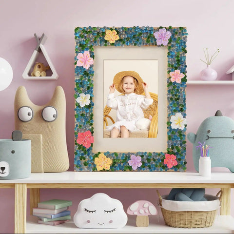 Mosaic Photo Frame Kit For Kids With Glass Pebbles, Hands On Arts And Crafts Activity displayed on a shelf with toys.