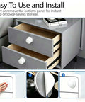 Six White Adhesive Cabinet Knobs Set No Drill Peel And Stick Cabinet Hardware installed on gray dresser drawers.