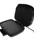 Heavy Duty Electric Panini Press And Grill With Dual Heating Non Stick Coating Smart Oil Filtering Tray showing open grill with nonstick surface.