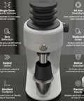 Game Changing Single Dose Coffee Grinder With 64 Millimeter Flat Burrs Stepless Adjustment Heavy Duty Zero Retention Build For Killer Espresso At Home Quiet Compact Design In Crisp White Finish showing 64 mm steel burrs and quiet design.