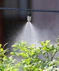 20 Piece Adjustable Sprinkler Drip Heads With Tee Joints Watering Mister System spraying over garden plants