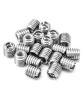 Pile of stainless steel threaded wood inserts with 1/4-20 internal threads, 5/8 inch long, shown in a 20 pack, for various wood types.