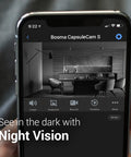 Smartphone displaying CapsuleCam Pro Baby Monitor 4 Pack 1080p HD WiFi Indoor Security Cameras night vision feature.