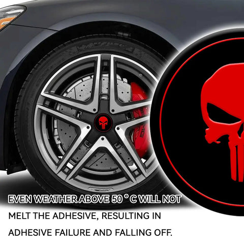 Fresh Four Pack Wheel Center Cap Stickers Featuring A Dope Skull Design In Vivid Red for 2.2 inch wheels, mounted on a car wheel.