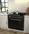 Modern kitchen with black stove, white cabinets, marble countertop, and adjustable gold cabinet pulls 10 pack for kitchen cabinets.