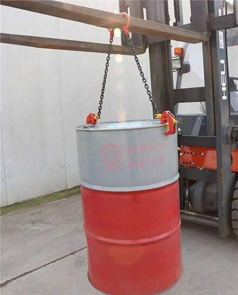 Heavy Duty 2200 Lbs Vertical Drum Lifter With Double Chains For Metal Barrels lifting a metal barrel using a forklift.