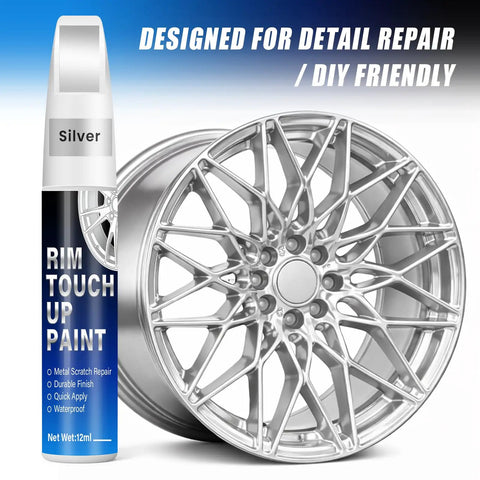 Universal Silver Rim Touch Up Paint With Built In Brush For Curb Rash And Wheel Scuff Scrapes Fast Curing Formula in 12ml bottle next to alloy wheel.