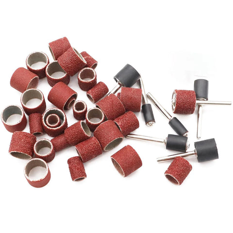 Sunxeke sanding drum set components: red aluminum oxide sleeves and mandrels scattered on white background, front view