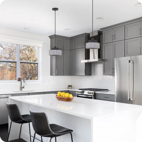 Stylish kitchen with Xander 11 Inch Modern Pendant Light With Concrete Drum Shade And Textured Black Finish Over Island
