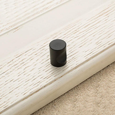 12 Pcs Cylindrical Cabinet Handles And Mini Drawer Pulls In Black For Cabinets Wardrobes Drawers And Jewelry Boxes 0.7 By 0.9 Inch Knobs Sturdy Zinc Alloy Construction Space Saving Hardware With Subtle Modern Minimalist Style on cabinet door