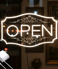 Lit Neon Open Sign For Business With Dimmable LED Warm White Glow, 16.5 By 10.5 Inch, Includes 12V 2A Adapter hanging in window