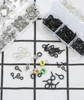 Must Have 300Pcs Small Screw Eye Pins For Jewelry Making And DIY Crafts in black and silver, three sizes 8x4mm, 10x5mm, 13x6mm on display