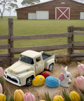 Vintage Easter Farmhouse Mini Diecast Metal Pickup Truck Decor With Eggs And Bunny for tiered tray display in a garden setting