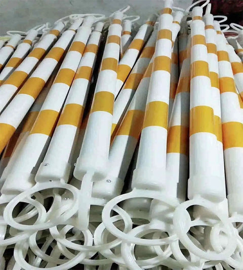 Hella Rugged Retractable Traffic Barricade Bars 10 Pack Extendable 4 To 7 Feet, yellow and white, for road work setup.