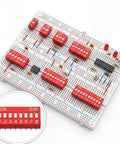 Red Dip Switch Kit For Breadboards, 2.54mm PCB Mount On Off Toggle Switches, Double Row Assortment Installed on Breadboard