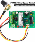 PWM DC Motor Speed Controller 10 To 30V 3A 120W with Forward Reverse Stop Switch on green circuit board close-up