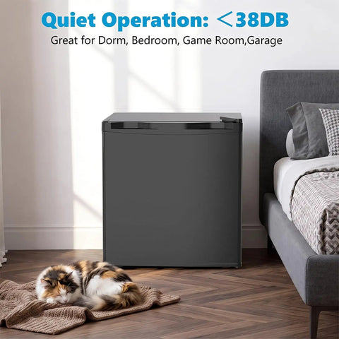 Rock Solid 1.6 Cu Ft Mini Fridge With Freezer Tight Compact Upright Cooler in bedroom with a sleeping cat on a rug.