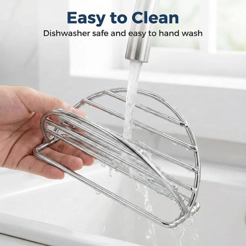 4 Piece Stainless Steel Taco Holder Stand Set With V Shaped Multi Layer Taco Rack being rinsed under a faucet in a sink