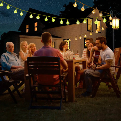 Backyard night party with Beefy 100 Inch Outdoor String Light Poles 2 Pack For Garden Patio And Wedding Decor, illuminating group gathering