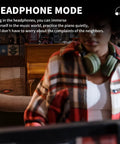 Person using 88 Key Weighted Keyboard Piano With Hammer Action in headphone mode for quiet practice at home.