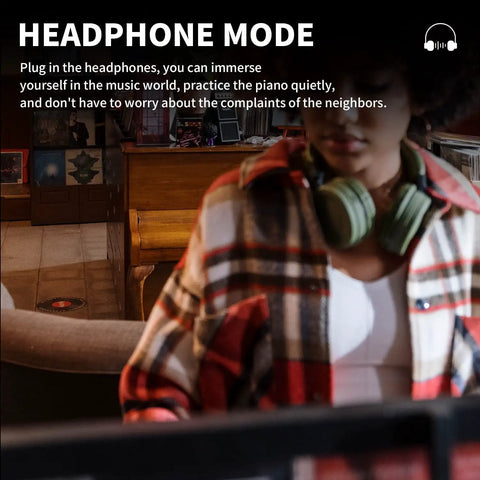 Person using 88 Key Weighted Keyboard Piano With Hammer Action in headphone mode for quiet practice at home.