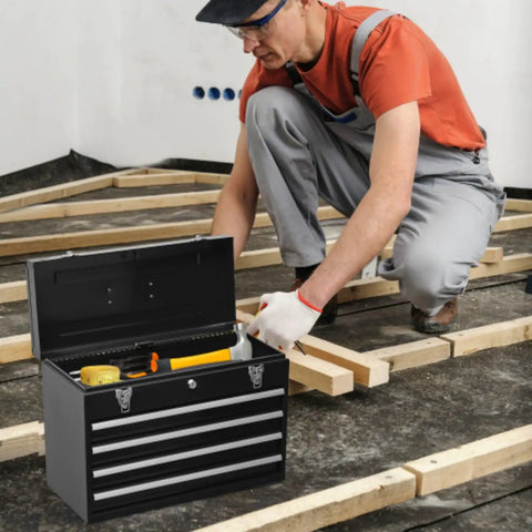 Worker using 20.5 Inch Portable Metal Tool Box With Four Ball Bearing Sliding Drawers Auto Lock Security Powder Coated Finish on site
