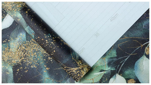 Close-up of Peel And Stick Boho Forest Wallpaper Removable Mural in black green matte gold, adhesive backing, 17.7in x 9.8ft.