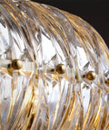 Sleek Modern Crystal Chandelier Ceiling Light With Adjustable Gold Pendant Ring showcasing clear K9 glass circles and warm illumination.