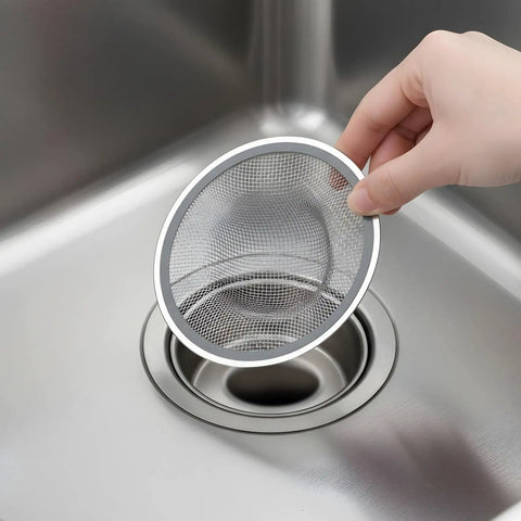 Heavy Duty Mesh Sink Strainers 40 Pack Stainless Steel Drain Screens Size 4 5 Inch Fits Kitchen Bathroom Sinks in use.