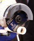 Three Inch Cut Off Wheel Kit With One Quarter Inch Stem Mandrel For Die Grinder, mounted for metal cutting.