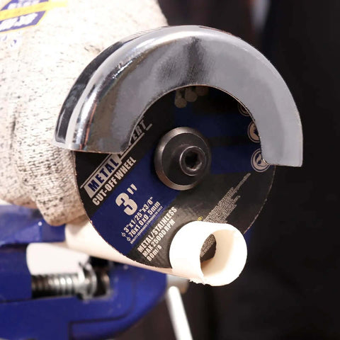 Three Inch Cut Off Wheel Kit With One Quarter Inch Stem Mandrel For Die Grinder, mounted for metal cutting.