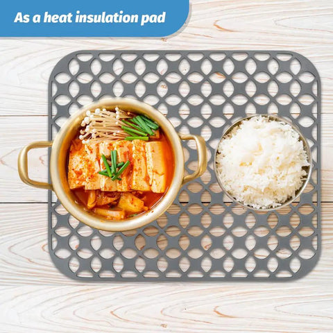 Heat Resistant Silicone Sink Mats for Kitchen, Two Pack 13.8 by 11.4 Inches used as heat insulation pad with pot and rice bowl.