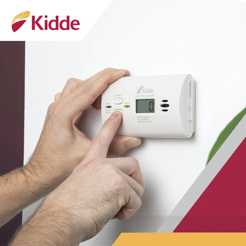 Carbon Monoxide Detector Portable CO Alarm With AA Battery Power, LED Indicators, Test Reset Button, Low Battery Indicator, No Wiring Needed, Quick Wall Or Tabletop Safety Monitoring installed on a wall.