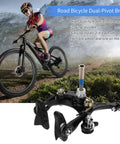 Deadly Smooth Road Bike V Brake Set Featuring Heavy Duty Mechanical Dual Pivot Calipers With Tough Aluminum Alloy Housing For Grip Tight Front And Rear Wheel Control In Sleek Black mounted on a bike, showing the dual-pivot design.