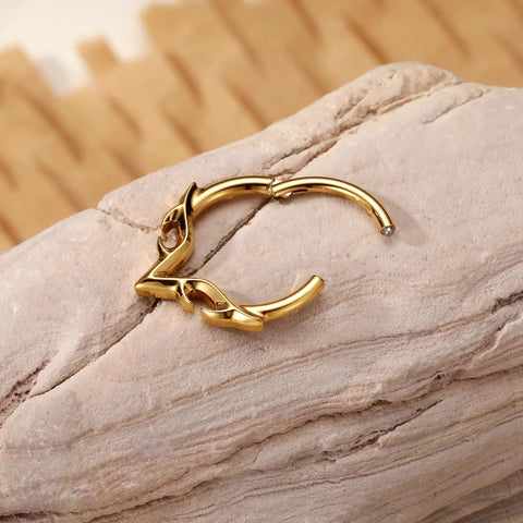 Gold Blade Wings V Shape Septum Ring 16G 1.2mm Stainless Steel Nose Hoop 8mm Daith Helix Tragus Rook Conch Cartilage Earring For Women Dope Everyday Accessory on stone surface