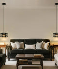 Farmhouse Pendant Light With Wood And Metal Cage in living room with black sofa and side tables, rustic white wood pendant with glass