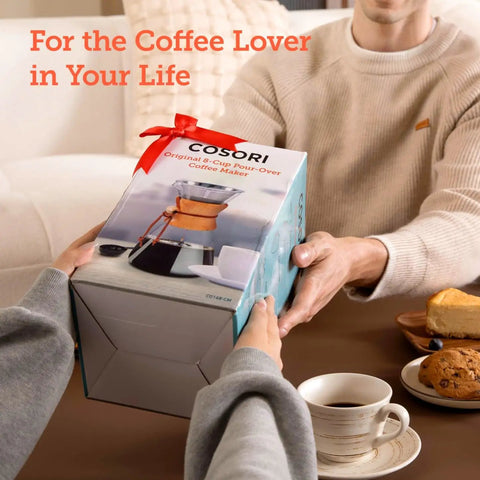 Person receiving a Pour Over Coffee Maker with Double Layer Stainless Steel Filter for Rich, Smooth Flavor, 8 Cup 34oz Drip Brewer gift box