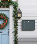 Locking Wall Mounted Mailbox Built Tough From Galvanized Steel, Large Capacity Postbox with weatherproof anthracite gray finish on house