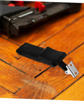 Flexible Spring Latch Car Hood Catch Heavy Duty Elastic Draw Latch on wood floor close-up view