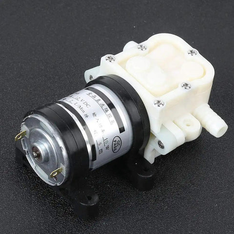 Qudinip Dc 12V Diaphragm Pump With Self Priming 10M Lift For Water Transfer. Leak Proof Design Keeps Liquid Away From Metal Parts. No Mechanical Seal Means Zero Oozing. Run Continuous Or Under Load Without Overheatin'. Perfect For Moving Fluids Fast And