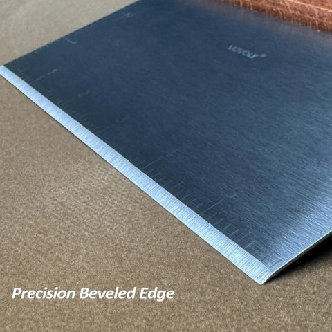 Heavy Duty Bench Scraper For Flat Top Griddle with precision beveled edge, stainless steel surface on wooden background