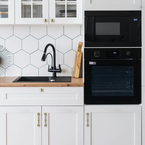 Kitchen with white cabinets featuring Premium Solid Brass Cabinet Pull And Drawer Knob With Modern Grooved Base Set Of 10