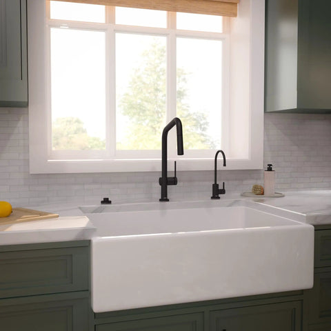 hansgrohe Talis N Pull Down Kitchen Faucet, Modern, Magnetic Hand Sprayer, 1-Handle, 1.75 GPM, Matte Black, 72864671 in kitchen with white sink.