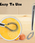 Two Piece Stainless Steel Mini Egg Whisk Set With Spring Coil Design for mixing eggs in a bowl, handheld kitchen tool visible.
