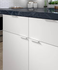 Lincoln Collection 3 1/8 Inch Center to Center White Modern Cabinet and Drawer Edge Pull Handle installed on kitchen cabinets