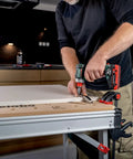 Badass 18 Volt Cordless Brushless Drill Driver delivering 60 Newton Meters of torque used to install hinges on a workbench.