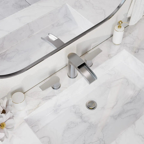 Brushed Nickel Waterfall Bathroom Faucet For Your Vanity Sink Widespread 3 Hole 8 Inch Design Solid 304 Stainless Steel Construction Includes Pop Up Drain And Water Supply Lines installed on marble countertop